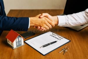 kadet sopimusta allekirjoittamassa poydan aaressa