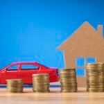 kahden-auton-ja-setelipinon-vertailukuva